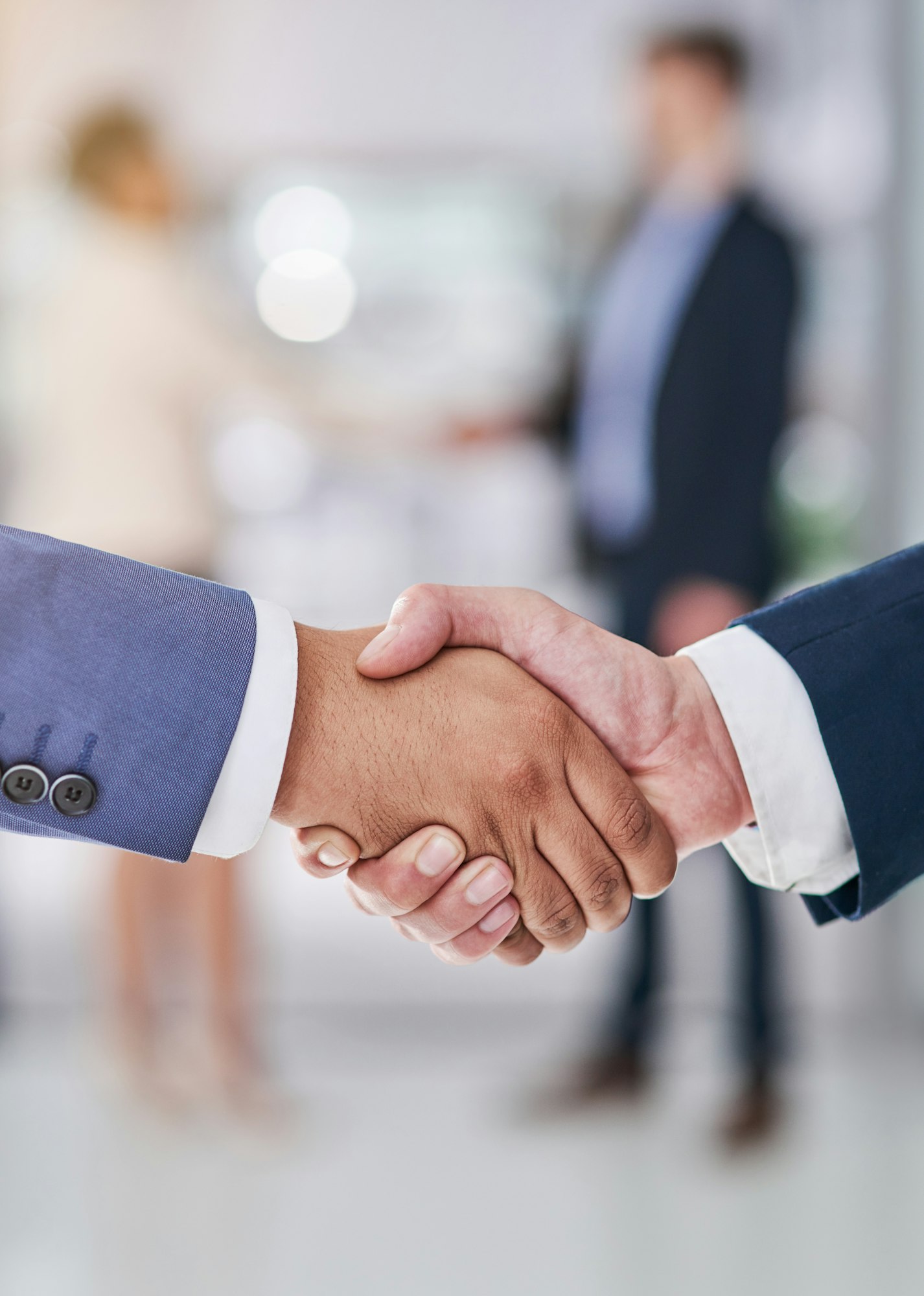Company collaborations. Shot of businesspeople shaking hands.